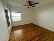 Bedroom comfortably fits a king-sized bed - 839 21st St Unit Apt. B