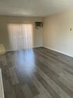 Living area and Balcony - 10729 New Haven St