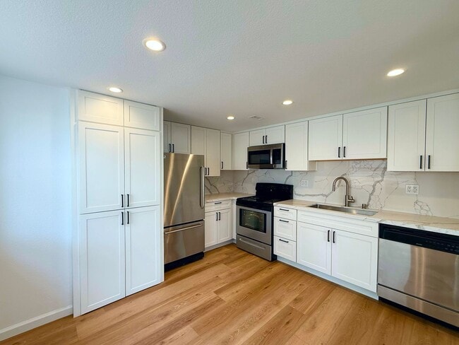 Photo - Experience refined coastal living in the h...