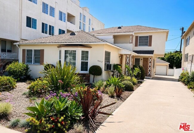 Building Photo - 10612 Wilkins Ave Unit 1