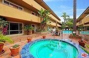 Warm up on cool nights with friends in hot tub with 24 soothing jets - 970 Palm Avenue Unit 107