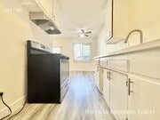 Photo - 1088 W 39th St Unit 11