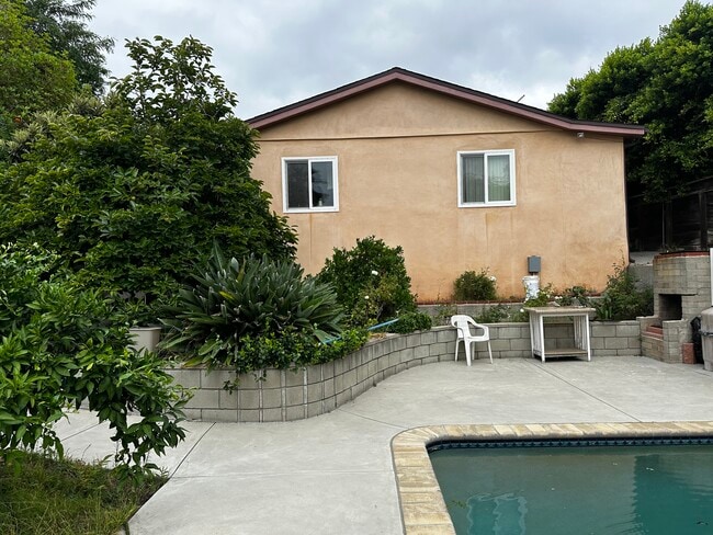 Back wall of the unit & backyard - 1054 E Providencia Ave Unit #B