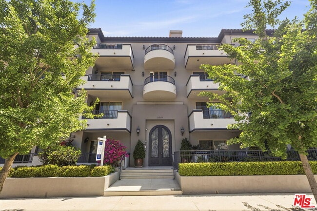 Building Photo - 11218 Camarillo St Unit 303