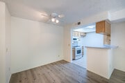 2BR, 2BA - 960SF - Dining Room - A & J Investments