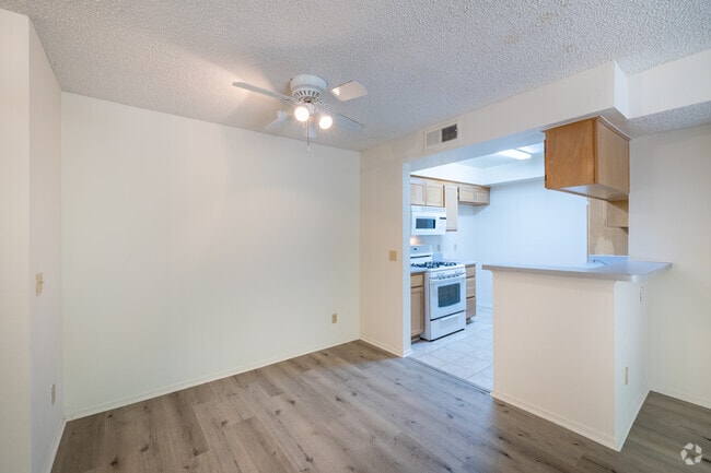 2BR, 2BA - 960SF - Dining Room - A & J Investments