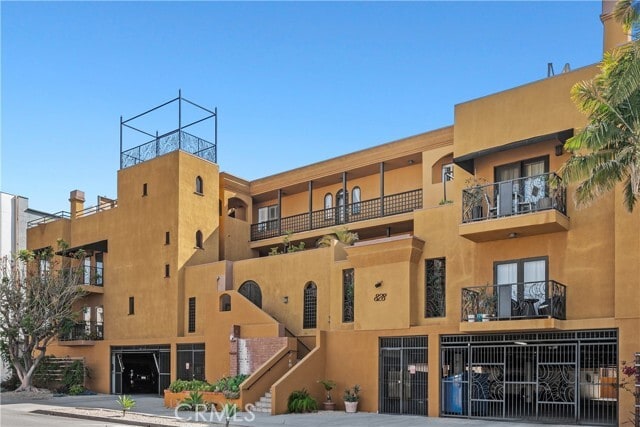 Building Photo - 828 N Hudson Ave Unit 106