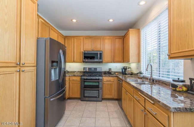 before cabinets painted - 530 Bannister Way