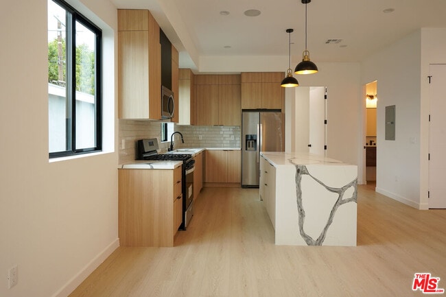 Photo - 13843 Burbank Blvd Townhome