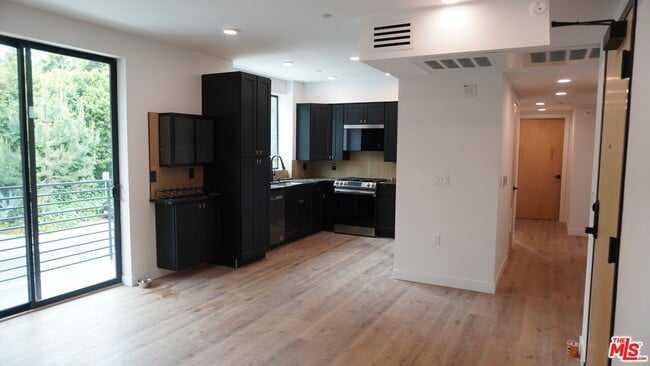 Building Photo - 10867 Fruitland Dr Unit 201