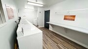 1 OF 3 LAUNDRY ROOMS - Belmont Place - Senior Community Apartments Unit 243