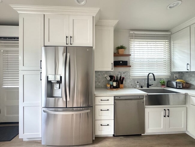 Stainless steel appliances including a dishwasher - 630 E San Antonio Dr Apartments Unit #1
