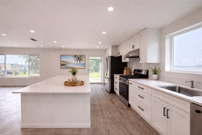 Photo - Newly Remodeled Interior 3BD! Enclosed Backyard! AC! Washer and Dryer!