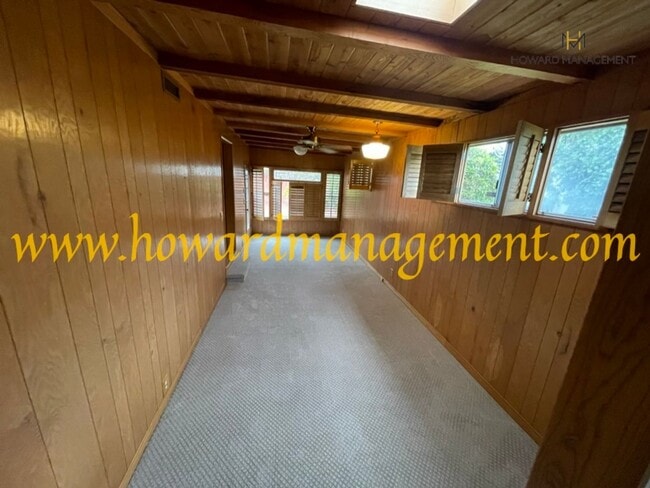 Photo - Beautiful home with large Den, hardwood floors, grassy backyard and dettached 2 car garage.