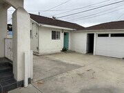 Front door & Garage Door - 3423 W 59th St Apartment Unit ADU