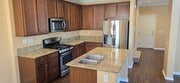 Photo - Beautifully maintained 2-bedroom, 2.5-bath with Loft • 1,504 sqft & 2-car garage.