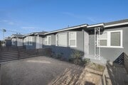gated entry with private front yard - 4091 Rosecrans Ave Townhome