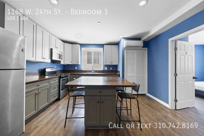 Building Photo - 1168 W 24th St Unit Bedroom 1
