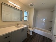 Photo - Free Month of Rent for Move in before Dec 1st - Large Brand New 2 Bedroom Apartment with Patio Unit 104