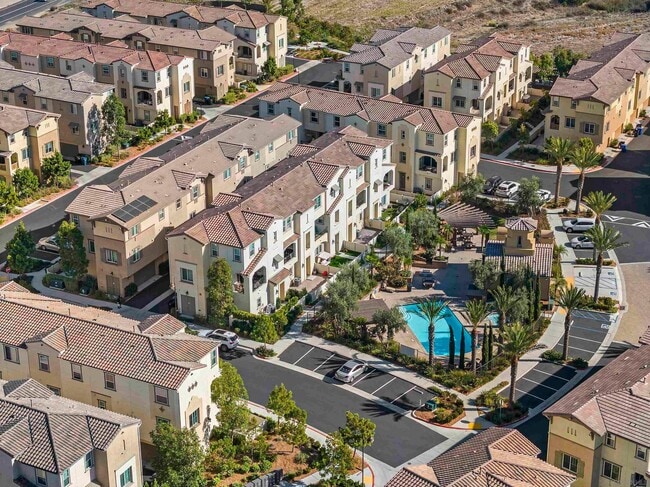 Photo - Stylish Three-Story Townhome with Private Courtyard & Pool Access