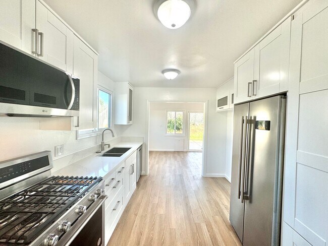 Photo - Beautifully Remodeled 4bd/2.5ba CLAIREMONT Home! Fenced yard, garage, PET friendly!