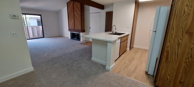 Cathedral ceiling with open floor plan. - 9150 Gramercy Dr Unit 292