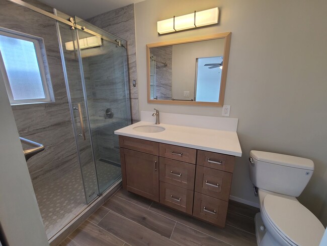 Photo - Spacious 4 bed 2 bath + 2 car garage & lar...