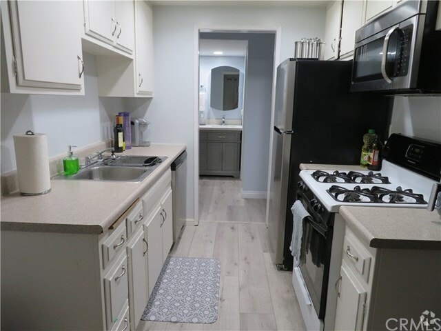 Building Photo - 1360 W Lambert Rd Unit Woodlake Village Rental
