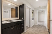 Hallway to bath and bedroom with wet bar - 1759 Silverwood Ter Unit Apartment 1