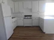 Kitchen has appliances. - 1050 Alta Ave House