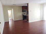 Living room view into apartment interior - 1644 Colby Ave Unit 6