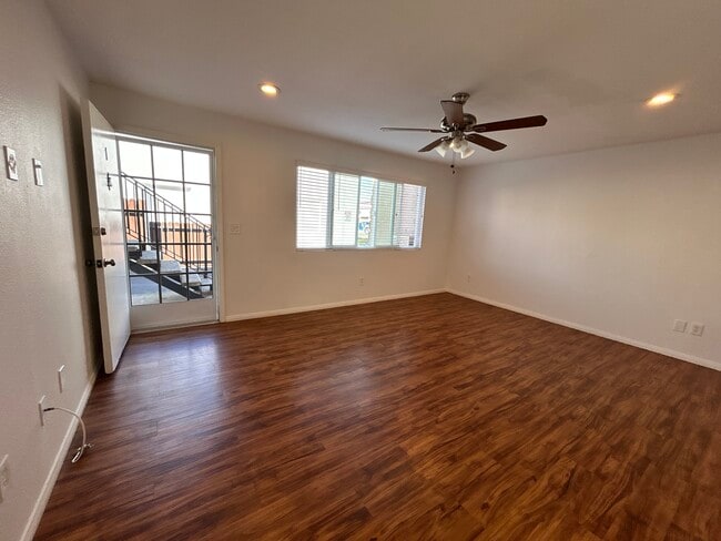 Large Living Room with large dual pane windows - 1601 Alabama St Unit 4