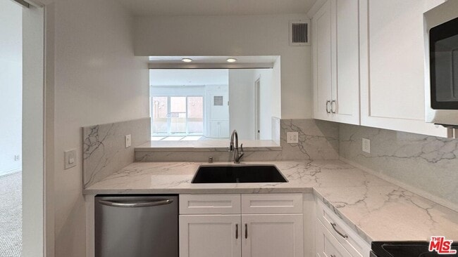 Photo - 11750 Sunset Blvd Unit 317