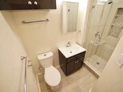 Bathroom with walk in shower. - 3036 E St