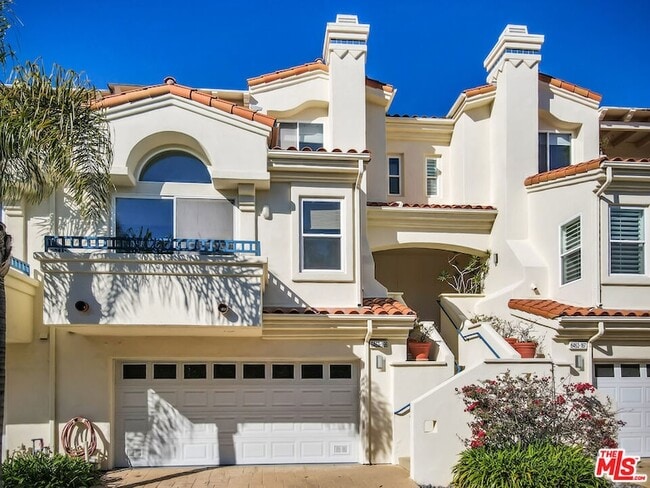 Building Photo - 6463 Zuma View Pl Unit 166