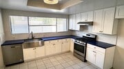 Photo - <<< spacious mast bedroom, pool, new kitch... House