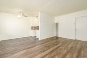 1BR, 1BA - 650SF - Living Room - 128 W Maple St Apartments