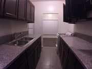 kitchen - 7404 S Western Ave Apartments