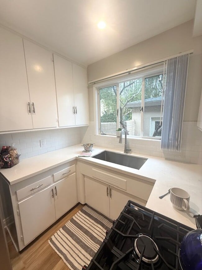 Building Photo - Milan Apartments Unit #A