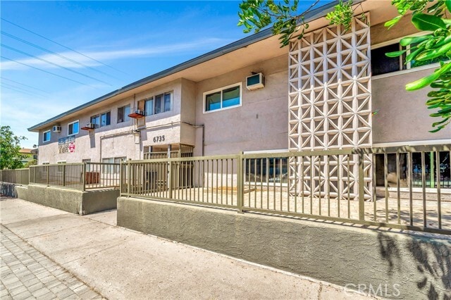 Building Photo - 6735 Elmer Ave Unit 9