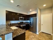 Photo - 3 Bed 2.5 Bath plus extra room Townhouse Style Condo / Attached 2 Car Garage
