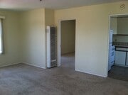 partial living room view toward bedroom - 4226 Wilson Ave Unit B