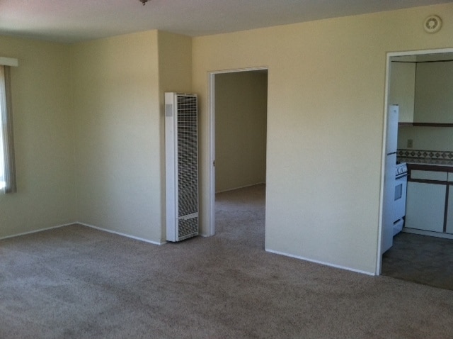 partial living room view toward bedroom - 4226 Wilson Ave Unit B