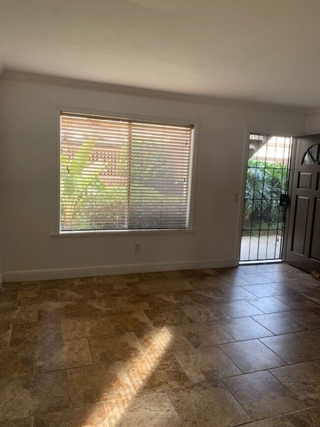 Photo - 1bd/1ba Lower, corner unit. Steps from BBQ area and laundry facilities.  Water/Sewer/Trash included! Unit 13