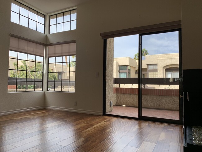 living room, balcony, fireplace facing north - 2601 S Broadmoor Dr Unit 2601 So Broadmoor Drive