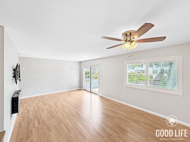 Photo - Spacious 2B/1.5BA Condo in Bay Park! Reserved Parking, Balcony, Fireplace Display & Pool! Unit 2