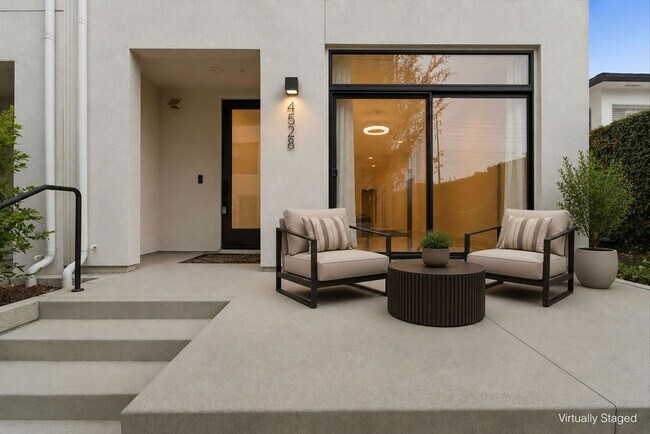 Photo - Modern 4-Bed with Rooftop Balcony & Dual Primary Suites