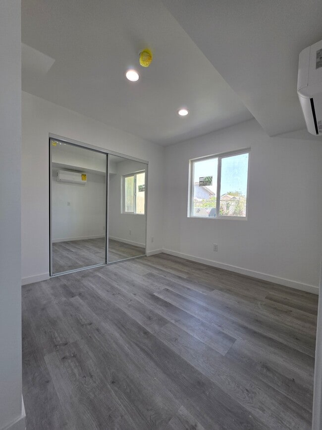 Photo - 635 W 51st St Apartment Unit three quarters
