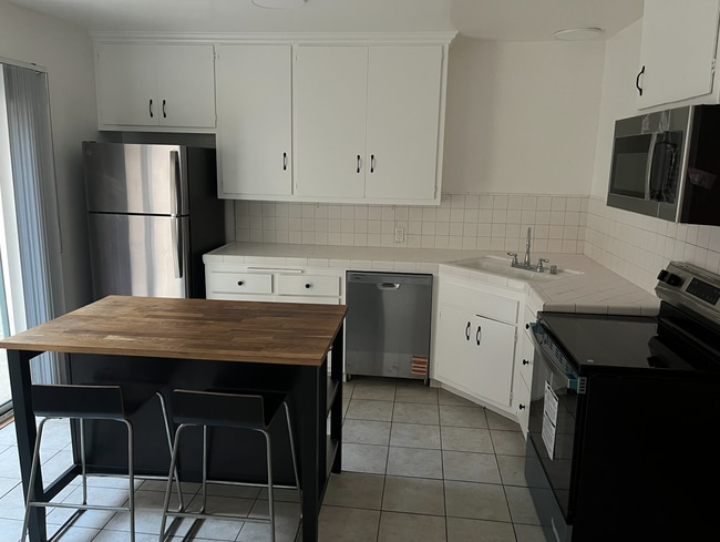 Kitchen with new appliances - 8315 W Manchester Ave Unit 2