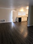 3 bdrm - looking towards kitchen - Villa Royale Apartments